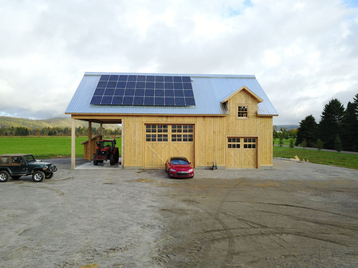 Grid-Tied Net-Metering Solar Panel System charging a Tesla EV car - front view